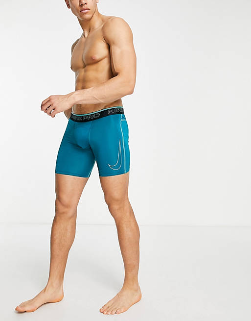 Hombre Pantalones cortos | Pantalones cortos azul cerceta ajustados de tejido Dri-FIT Pro de Nike Training - RE05711