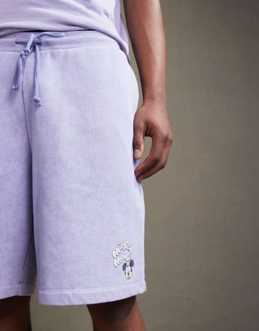 Pantalones cortos azul lavado unisex extragrandes con estampado de Mickey Mouse de Disney de ASOS DESIGN (parte de un conjunto), 3 de 4