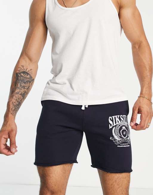 Pantalones cortos azul marino con estampado universitario de punto de SikSilk |