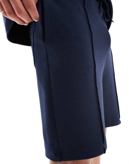 Pantalones cortos azul marino de corte slim extragrande de ASOS DESIGN, 2 de 5