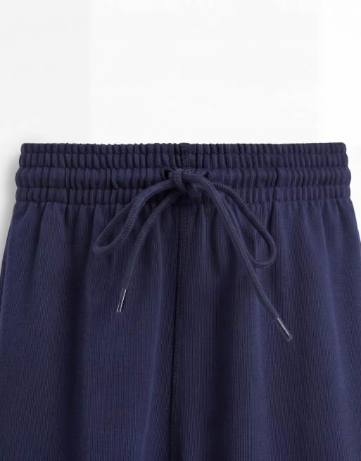 Pantalones cortos azul marino de punto de Nike Club, 8 de 9