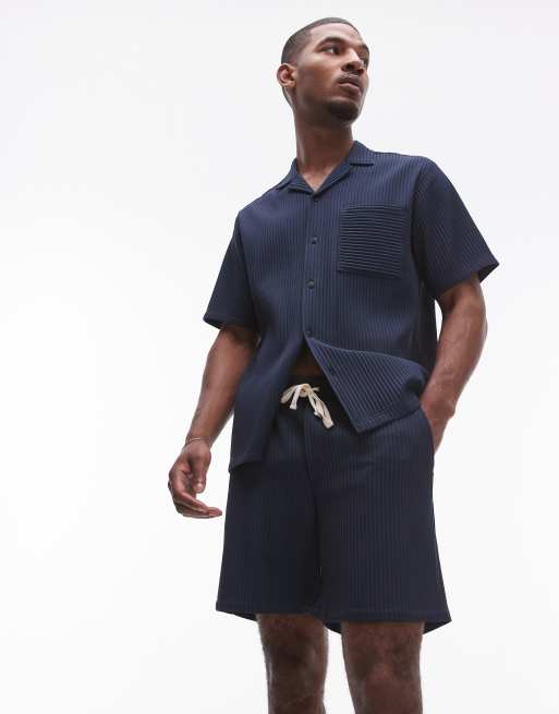Pantalones cortos azul marino plisados de Topman (parte de un conjunto)