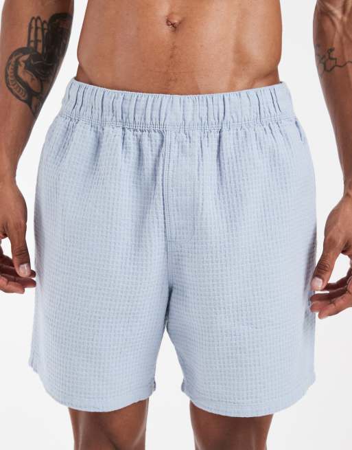 Pantalones cortos azules de largo medio con textura gofrada de ASOS DESIGN (parte de un conjunto), 4 de 6