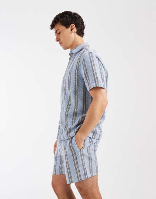Pantalones cortos azules de largo medio de tejido texturizado de ASOS DESIGN (parte de un conjunto), 3 de 5