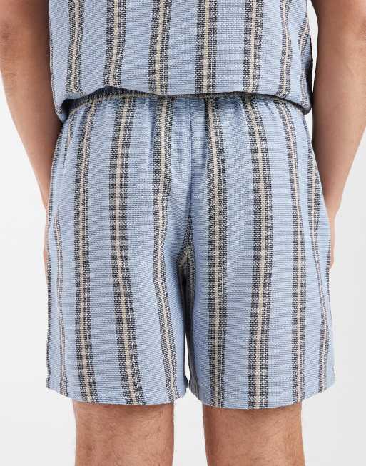 Pantalones cortos azules de largo medio de tejido texturizado de ASOS DESIGN (parte de un conjunto), 5 de 5