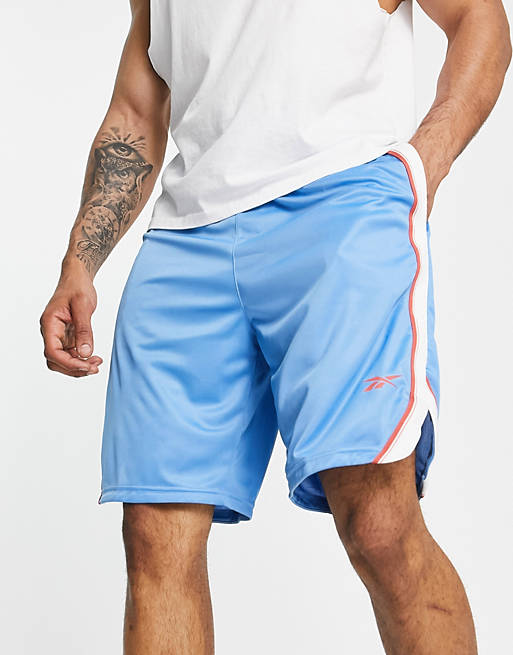 Hombre Pantalones cortos | Pantalones cortos azules de malla Workout Ready de Reebok Training - NX61175