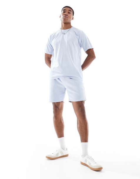 Pantalones cortos azules holgados con lavado ácido y detalle de costura de Another Influence - view 1