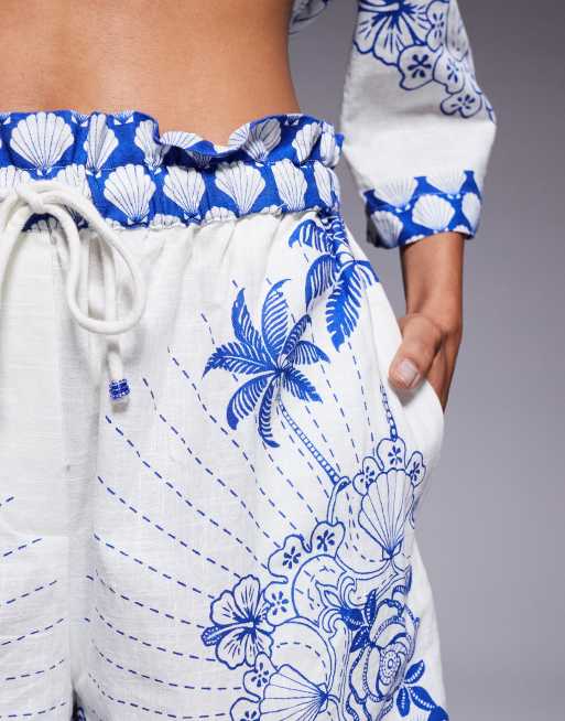 Pantalones cortos azules sin cierres con diseño estampado Riviera de River Island, 4 de 5