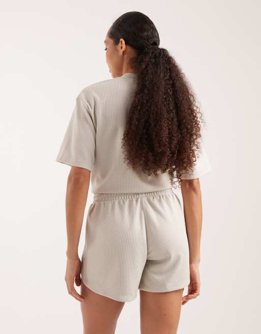Pantalones cortos beige de tejido gofrado Pacer workout de adidas performance, 4 de 5