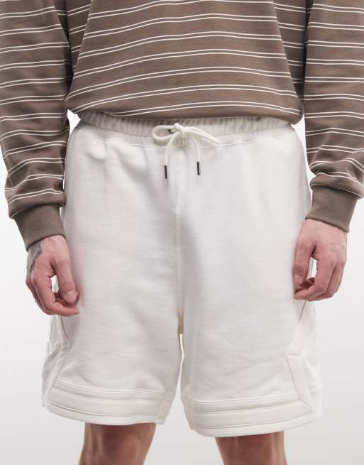Pantalones cortos blancos con diseño de rombos de felpa Flight de Jordan, 4 de 5