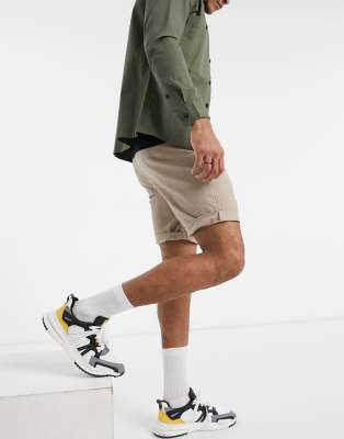 Pantalones cortos chinos color piedra de largo medio y corte pitillo de ASOS DESIGN 