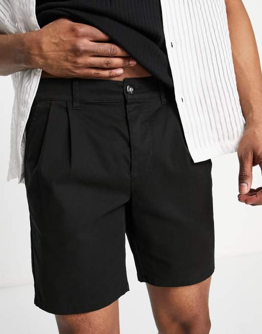 Pantalones cortos chinos negros de largo estándar y corte cigarette de ASOS DESIGN 