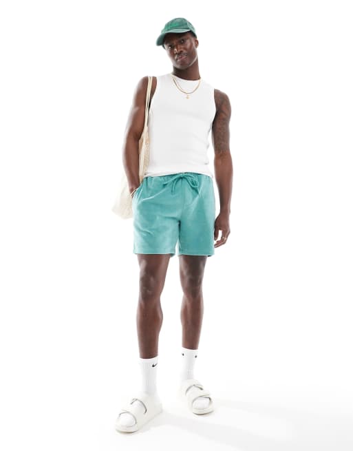 Pantalones cortos color cerceta de corte slim de tejido rizado de ASOS DESIGN