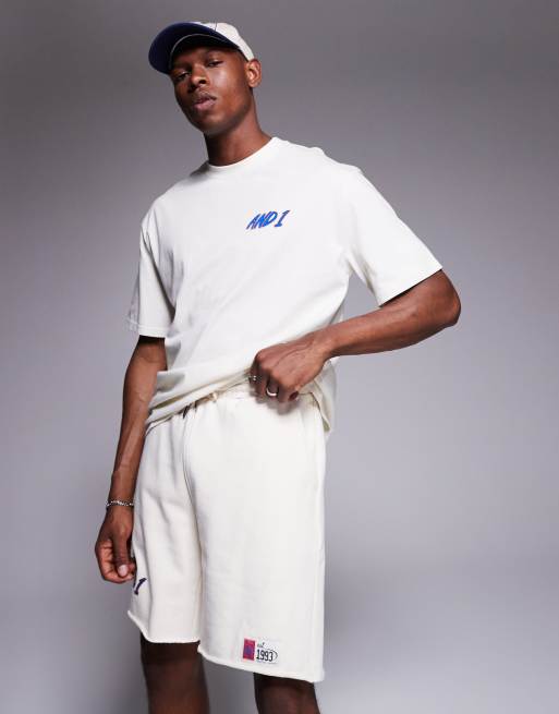 Pantalones cortos color crema extragrande con detalle de logo de punto liso de AND1