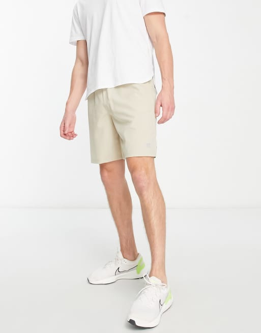 Pantalones cortos color piedra deportivos de largo medio de HIIT