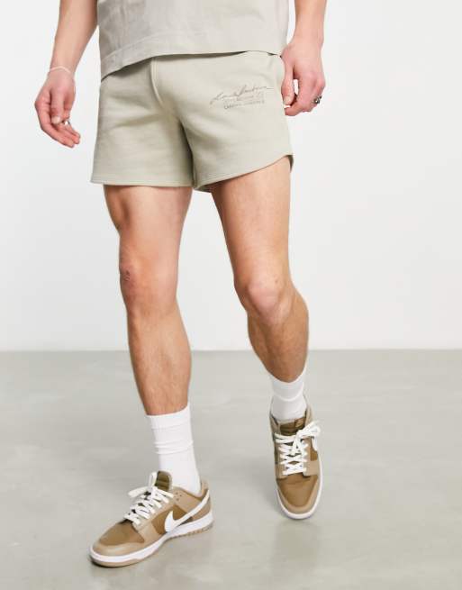 Pantalones cortos color piedra holgados de estilo deportivo con logo estampado de ASOS Dark Future (parte de un conjunto)