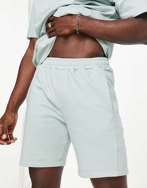 Pantalones cortos color salvia con ribetes de Topman