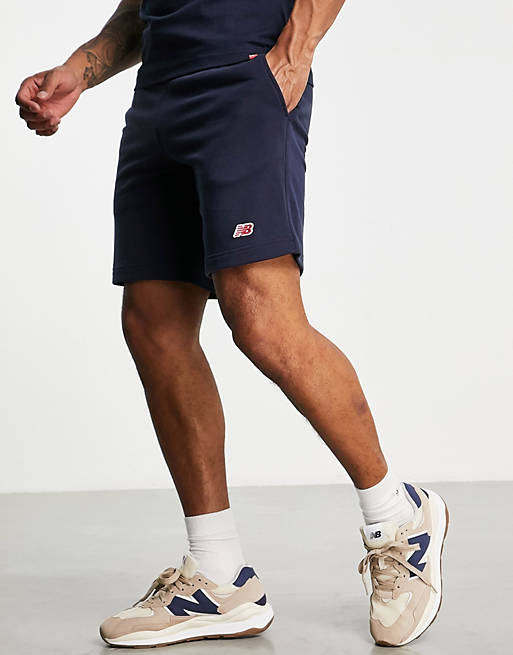 Hombre Pantalones cortos | Pantalones cortos con logo pequeño en azul marino de New Balance - AO05637