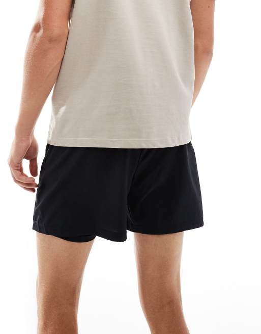 Pantalones cortos de 5" negros con forro Sport Essentials de New Balance, 2 de 5