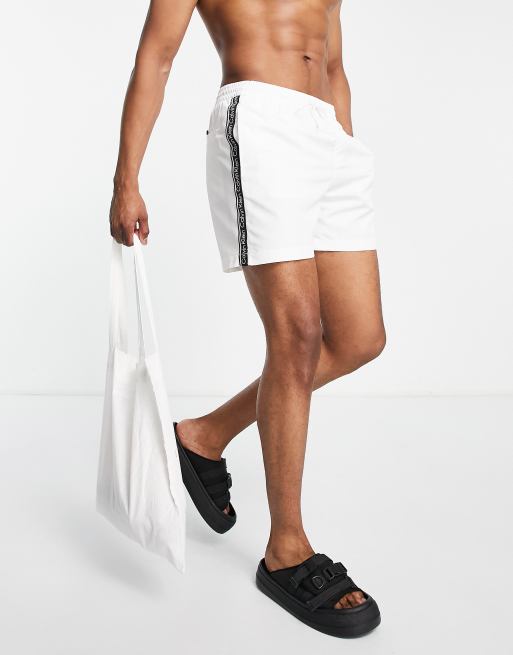 Pantalones de baño blancos con logo Klein | ASOS