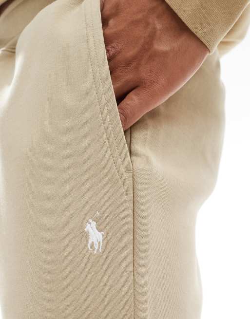 Pantalones cortos de chándal color camel con logo de icono de