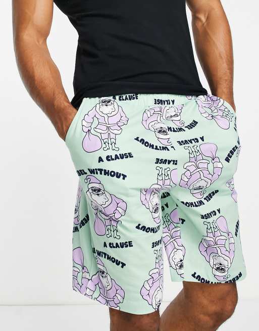 Pantalones cortos de estar casa con estampado navideño de Papá Noel de ASOS DESIGN |