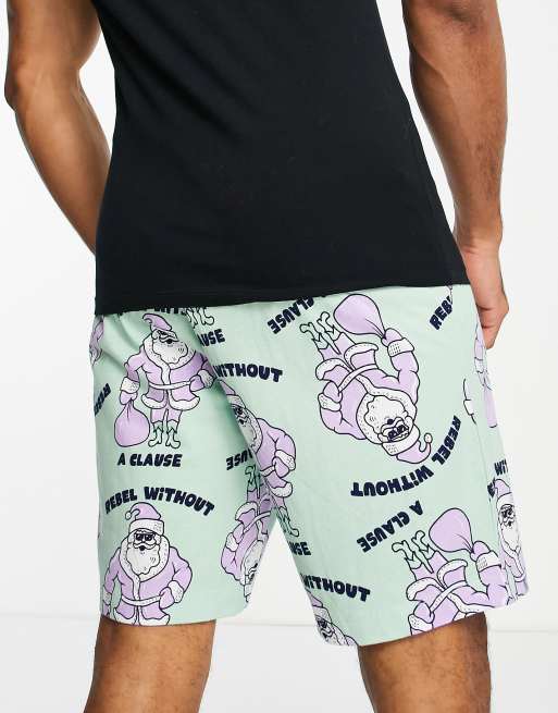 Pantalones cortos de estar casa con estampado navideño de Papá Noel de ASOS DESIGN |