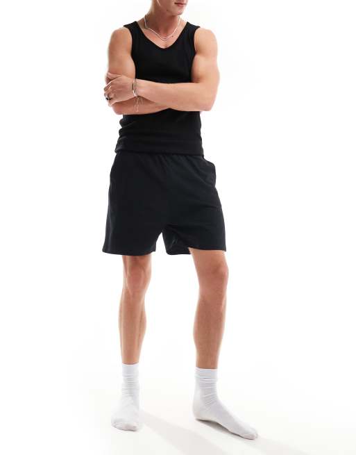 Pantalones cortos de estar por casa negros de punto liso de ASOS DESIGN, 2 de 5