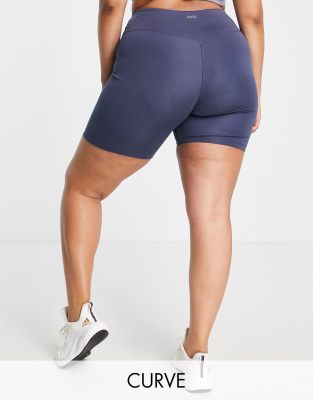 Pantalones cortos de estilo legging ajustados con detalle moldeador en el  vientre y logo de ASOS 4505 Curve