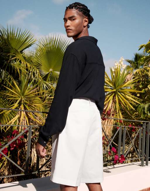 Pantalones cortos de vestir blancos estilo bermudas con pinza