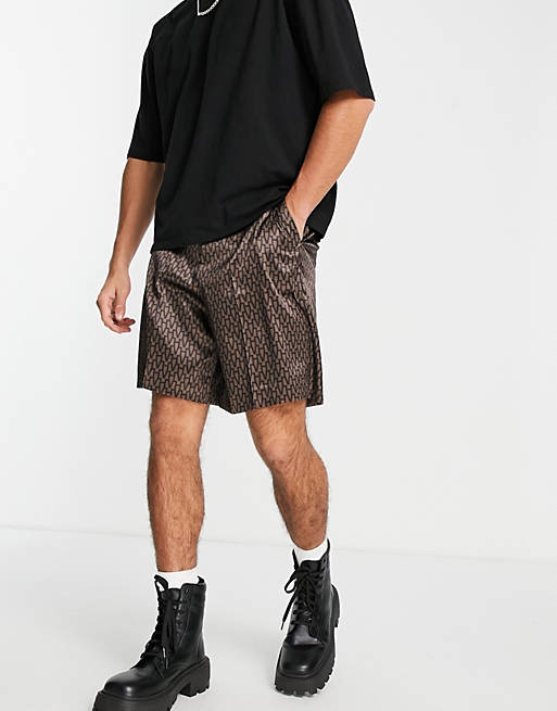 Hombre Other | Pantalones cortos de vestir marrones de pernera ancha con estampado geométrico retro de ASOS DESIGN - HL01534
