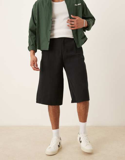 Pantalones cortos de vestir negros estilo bermudas con pinzas