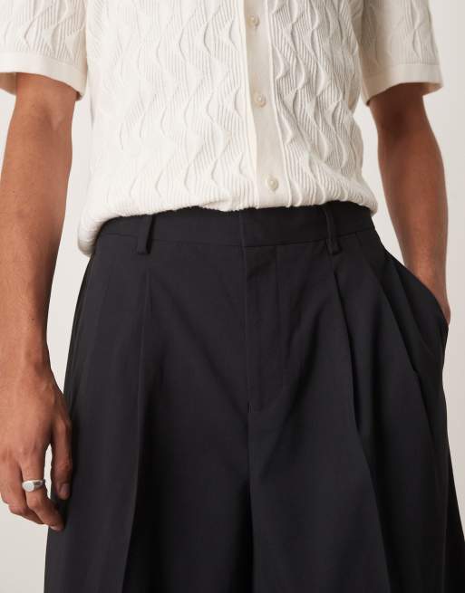 Pantalones cortos de vestir negros extragrandes de estilo bermudas con pinzas dobles de ASOS DESIGN, 2 de 5