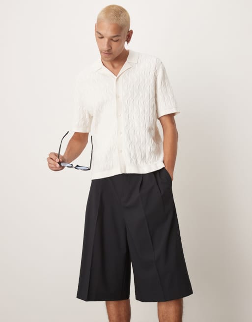 Pantalones cortos de vestir negros extragrandes de estilo bermudas con pinzas dobles de ASOS DESIGN, 3 de 5