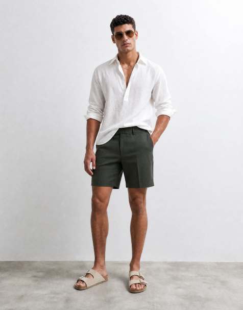 Pantalones cortos de vestir verde oscuro de corte estándar con bajos vueltos de ASOS DESIGN - view 1