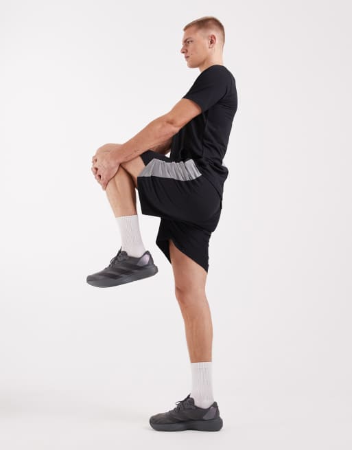 Pantalones cortos deportivos negros con logo de CAPO, 2 de 5