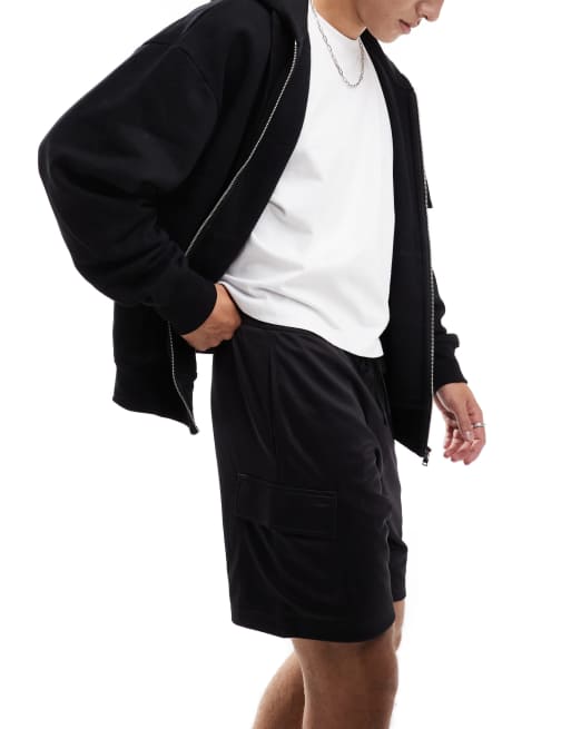 Pantalones cortos deportivos negros de estilo cargo de punto liso de 4505 , 3 de 5