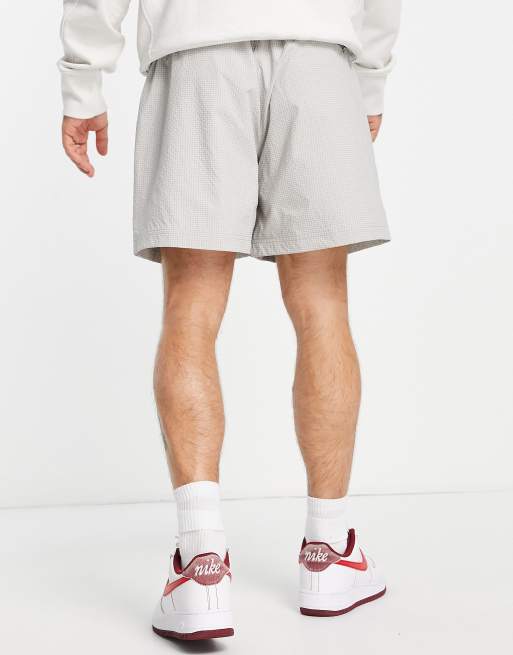 cortos gris hierro de sirsaca resistente al agua Trend de Nike |