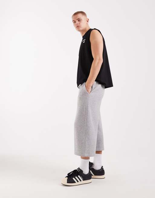 Pantalones cortos gris jaspeado de corte alargado extragrande de punto liso de ASOS DESIGN, 3 de 5