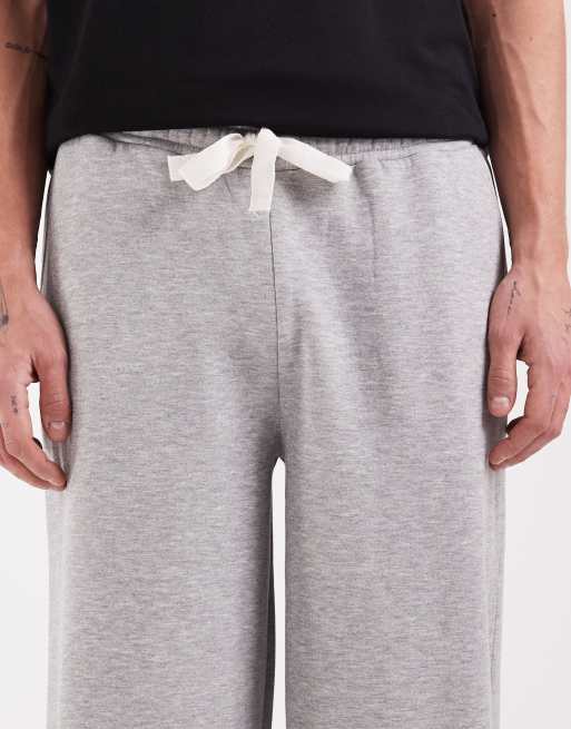 Pantalones cortos gris jaspeado de corte alargado extragrande de punto liso de ASOS DESIGN, 4 de 5