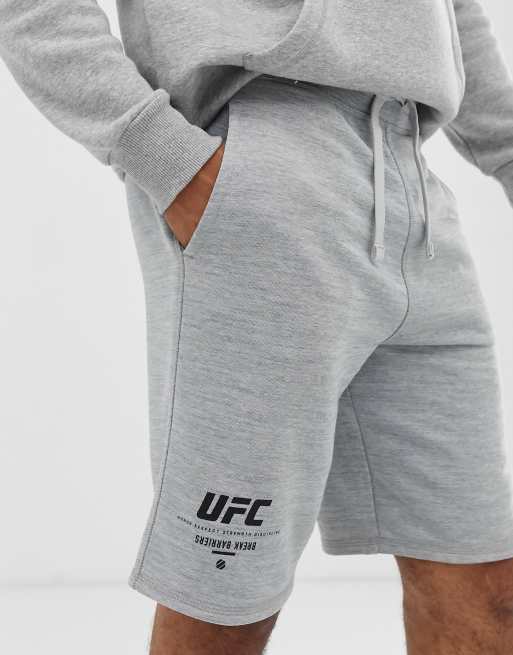 Admitir Perder la paciencia Susurro Pantalones cortos grises con logo UFC de Reebok | ASOS