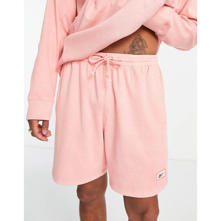 Pantalones reebok naranja on sale