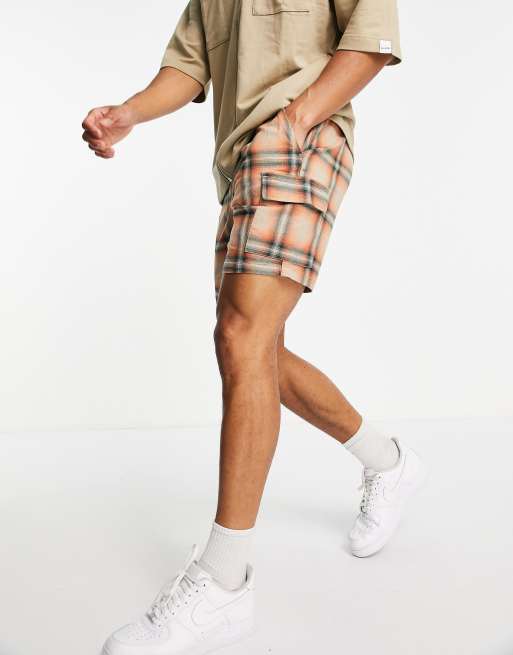 Pantalones cortos naranjas a cuadros de River Island 
