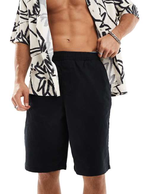 Pantalones cortos negros de corte alargado de lino de ASOS DESIGN