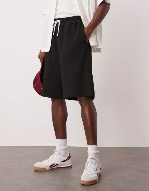 Pantalones cortos negros de corte alargado de sarga gruesa de ASOS DESIGN - view 1