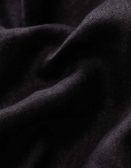 Pantalones cortos negros de corte estándar de mezcla de lino Olsen de Weekday, 3 de 4
