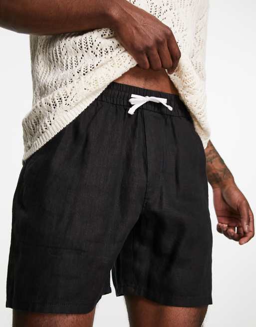 Pantalones cortos negros de corte estándar de mezcla de lino Olsen de Weekday, 4 de 4