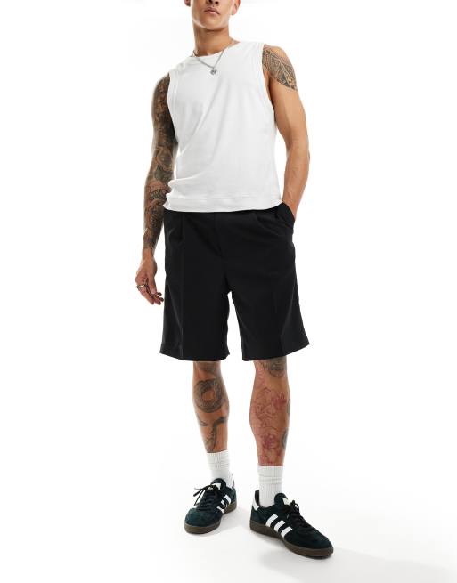 Pantalones cortos negros de corte sartorial holgado Uno de Weekday