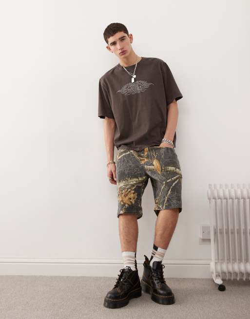 Pantalones cortos negros de estilo carpintero con estampado multicolor de GUESS Originals