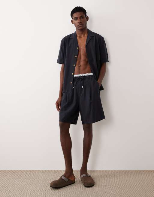 Conjunto negro con cuello de solapas de tejido texturizado de ASOS DESIGN, 3 de 3